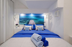 Santorini Style in Athens Plaza Luxury's Apartments